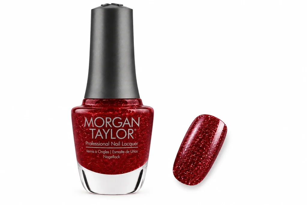 Morgan Taylor Rare As Rubies ruby red chunky glitter nail polish bottle with one nail painted in the glitter, one of the best glitter nail polish picks