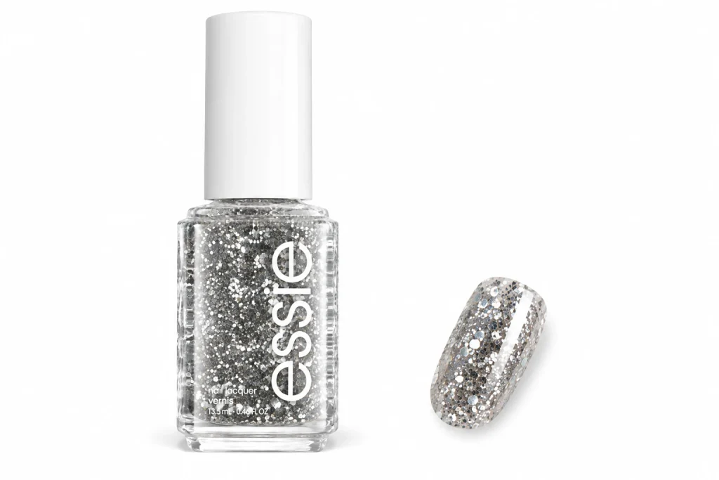 Essie Luxeffects Set In Stones silver glitter nail polish bottle with one nail painted in the glitter, one of the best glitter nail polish picks